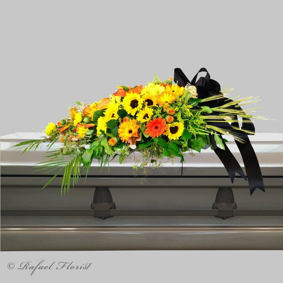 Floral Casket Spray Includes Lovely Gerbera Brilliant Sunflowers