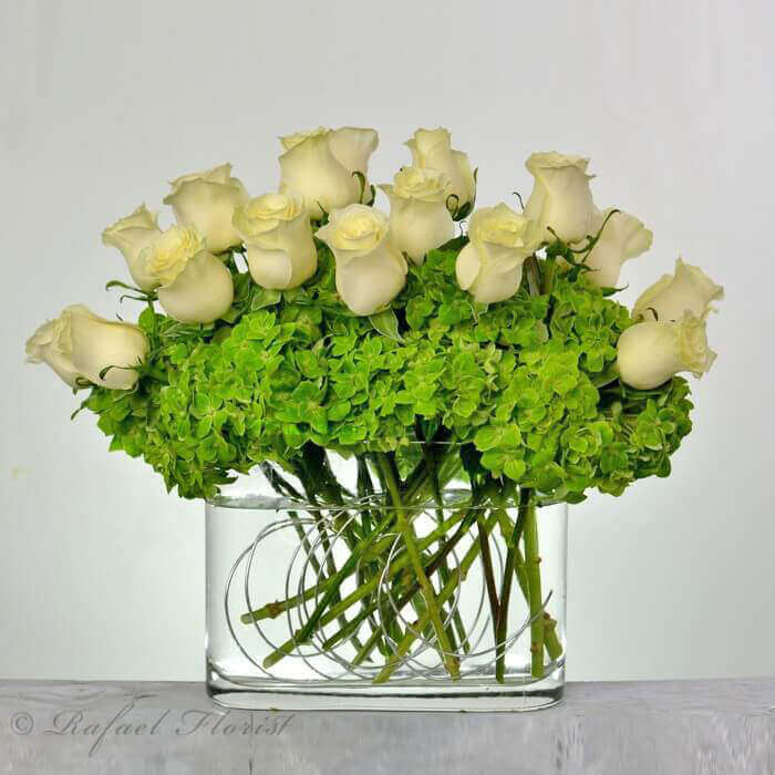 Contemporary Floral Arrangement Of White Roses And Green Hydrangeas