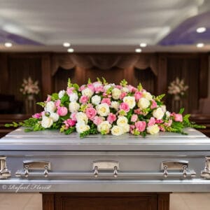 pink white funeral top of casket flowers - Tribute of Love Casket Spray - CS9