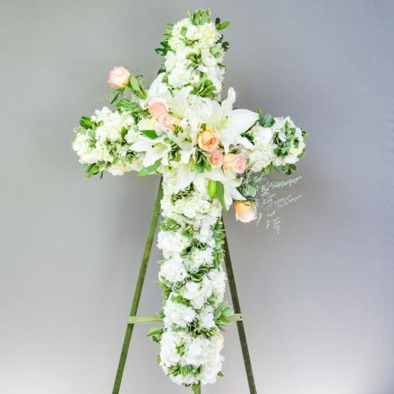 Floral Cross spray with peach roses and white lilies