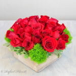 Simply Elegant Roses Red witht Dianthus green balls in wooden box - About Us