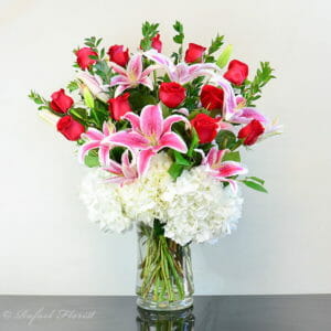 Standard Colors of Love Red Roses lilies white hydrangea lemon leaf in vase - V3 - Passionate Love